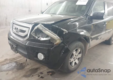 2011 Honda Pilot Touring z USA, uszkodzony, nr VIN 5FNYF4H92BB017544